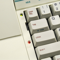 Close-up of Royal Scriptor keyboard showing margin release, tab, lock, shift keys, and status indicator lights